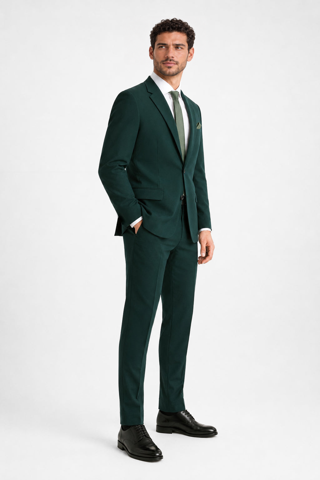 ntr-f40-p02-0766ec6fd18b | National Tuxedo Rentals Hunter Green Suit on a model, alternate view 1