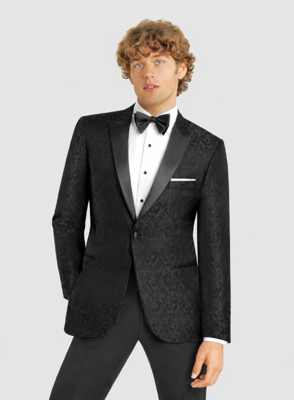ntr-grey-20261007-5869-f891b872216e | National Tuxedo Rentals Man wearing a black patterned tuxedo with satin lapels, white dress shirt, black bow tie, and pocket square.