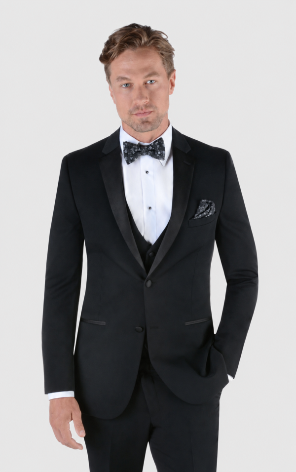 ntr-grey-20261007-5897-8c40ea6bf9e3-1 | National Tuxedo Rentals Black Desire Tuxedo Rental on a light grey background